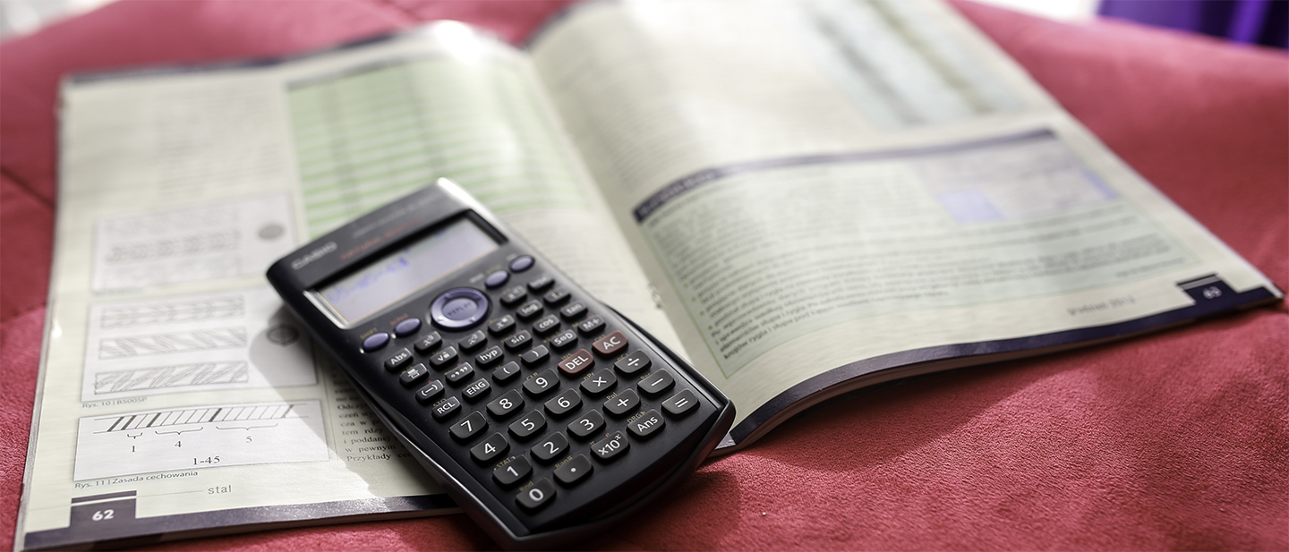 Calculator and Book Background Image